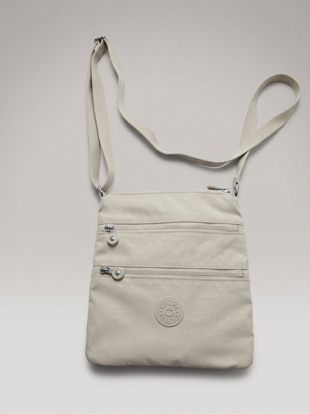 Kipling Light Gray Crossbody Bag with Key Charm